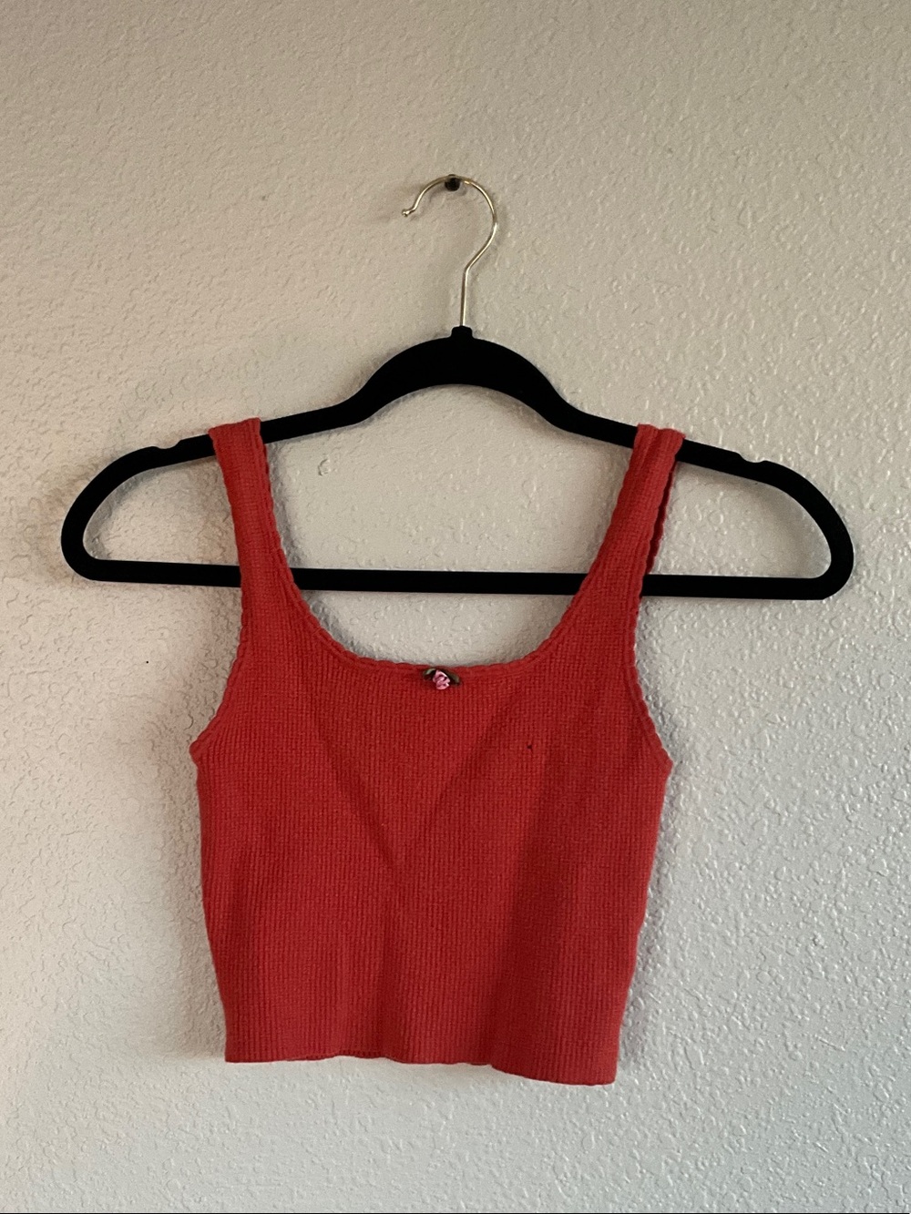 Cutesy bright tank with rose